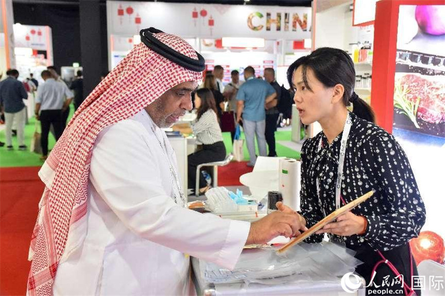 參展商交流。人民網(wǎng)塔里克·易卜拉欣攝