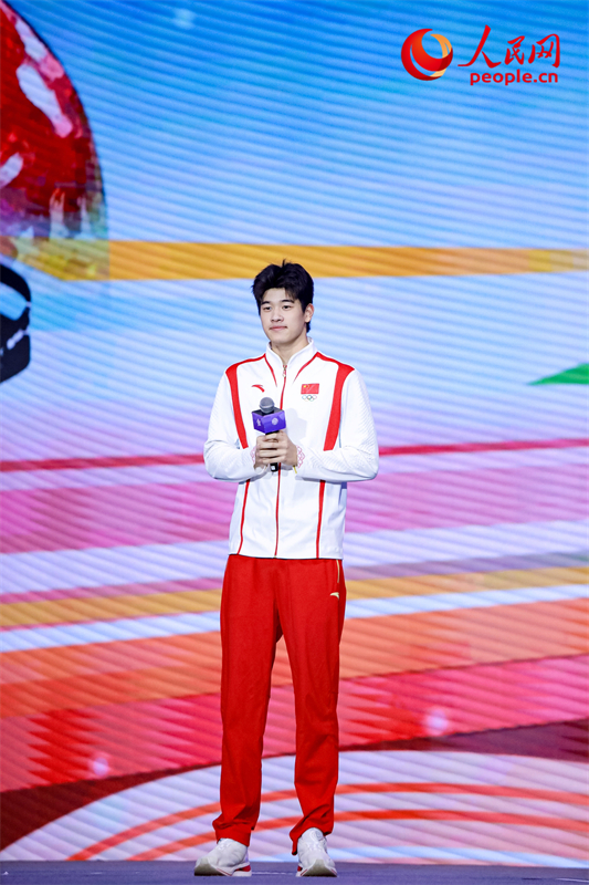 潘展樂分享自己的成長(zhǎng)經(jīng)歷。人民網(wǎng)記者 于凱攝