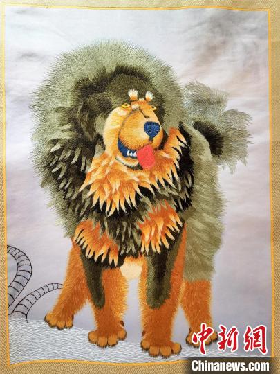 圖為藏繡作品?！∑钤鲚?攝